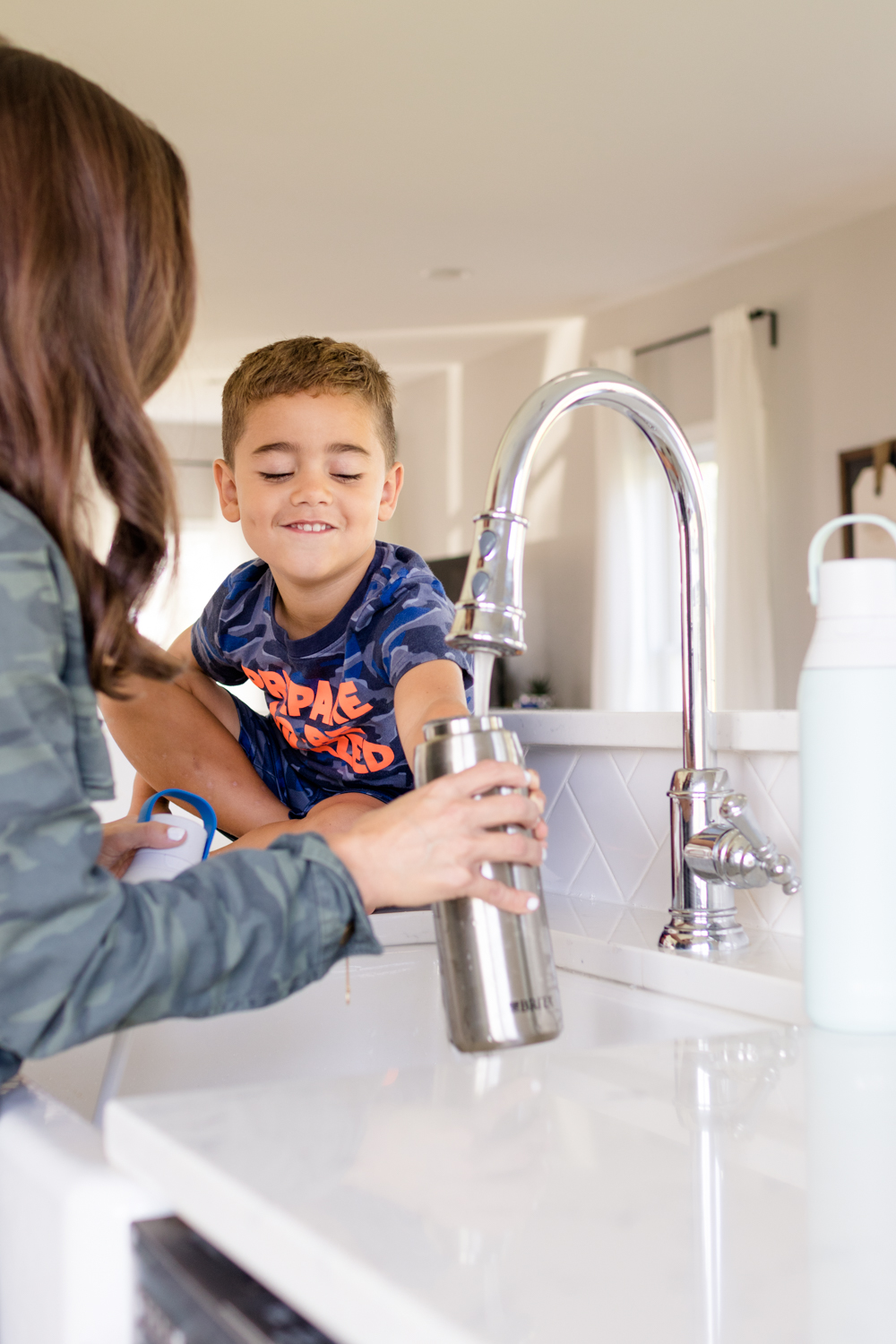 My family's sustainable swap via pumps and push-ups blog | Brita filtering bottle | Brita | water #ad 