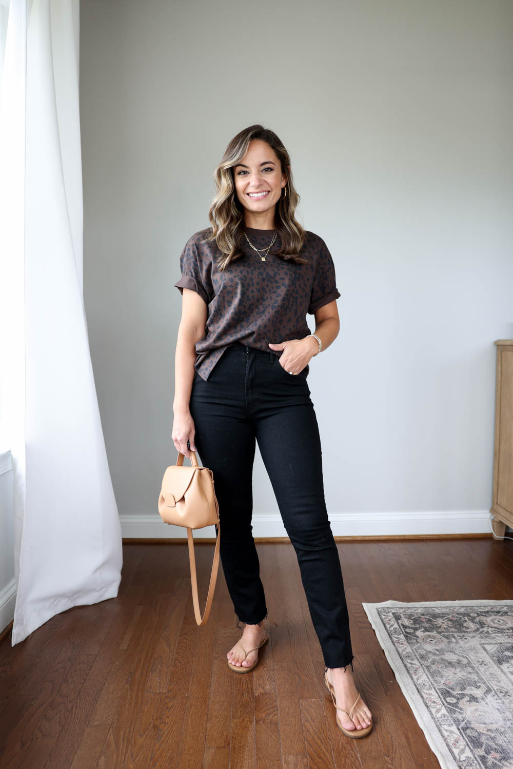 Petite-friendly ways to wear cropped flare jeans via pumps and push-ups blog | petite friendly jeans | jeans guide for petites fall 2024 via pumps and push-ups blog | black jeans outfits 