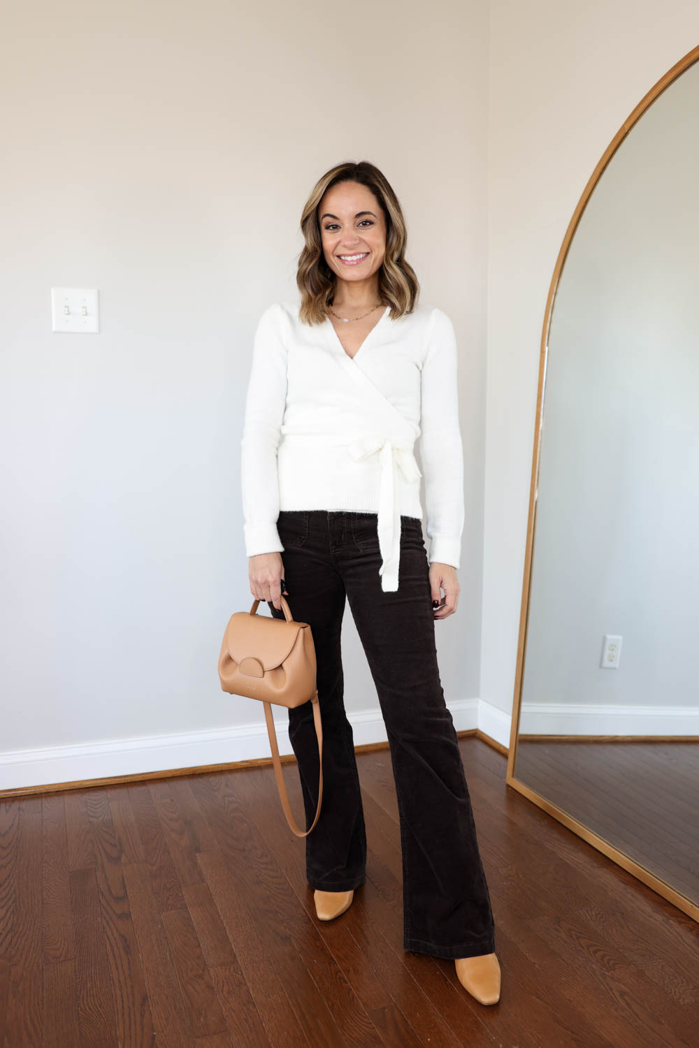 Casual outfit ideas for Thanksgiving via pumps and push-ups blog | fall outfits with flare pants | flare corduroy pants 