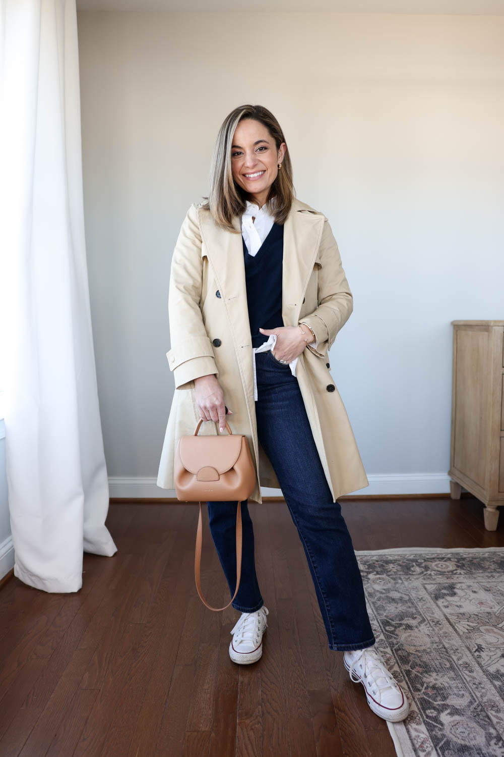 One base, four outfits with dark wash jeans and a white button down via pumps and push-ups blog | trench coat outfit | outfit with sneakers | spring transition outfit | straight jeans outfit 