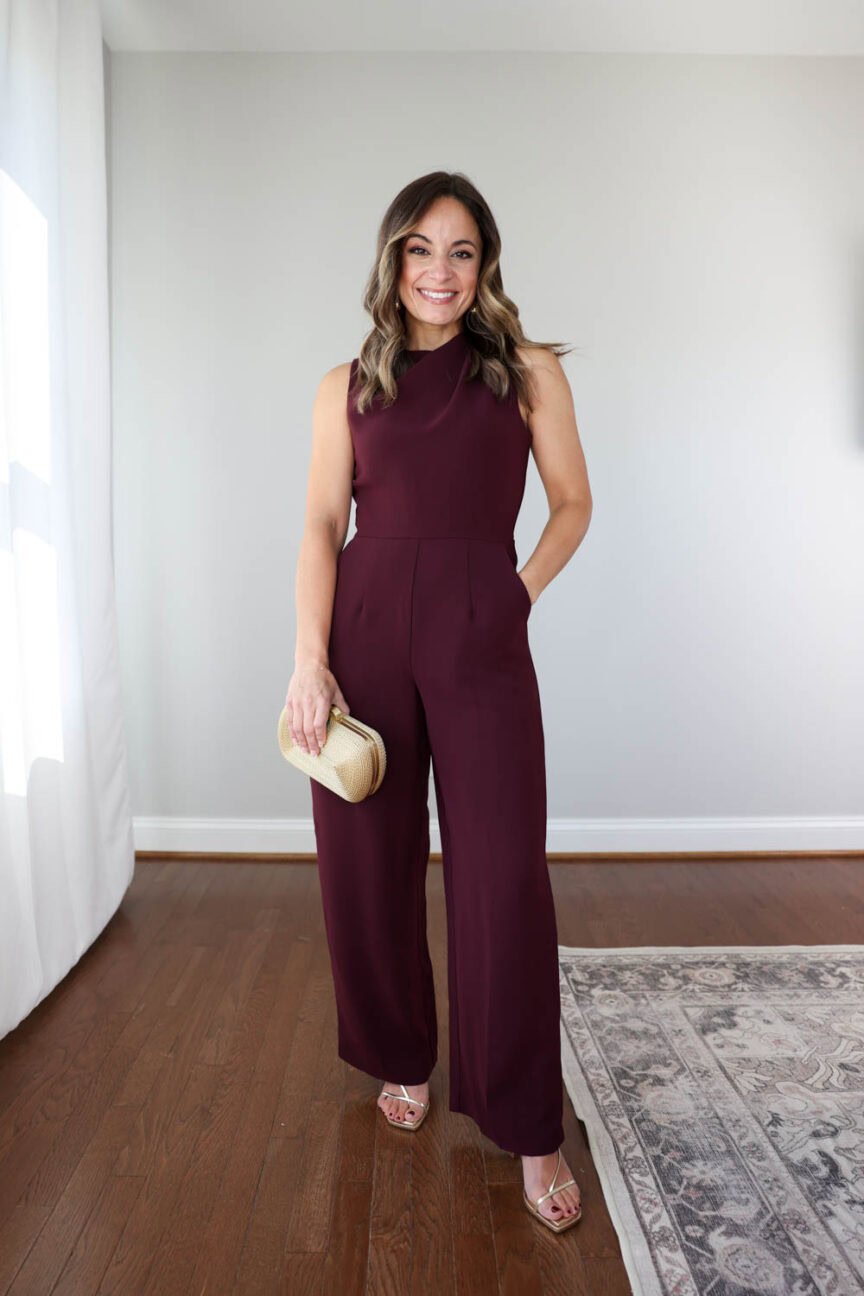 Petite style blogger Brooke of Pumps and Push-Ups in a Banana Republic Factory Cowl-Neck Jumpsuit, perfect for fall weddings.