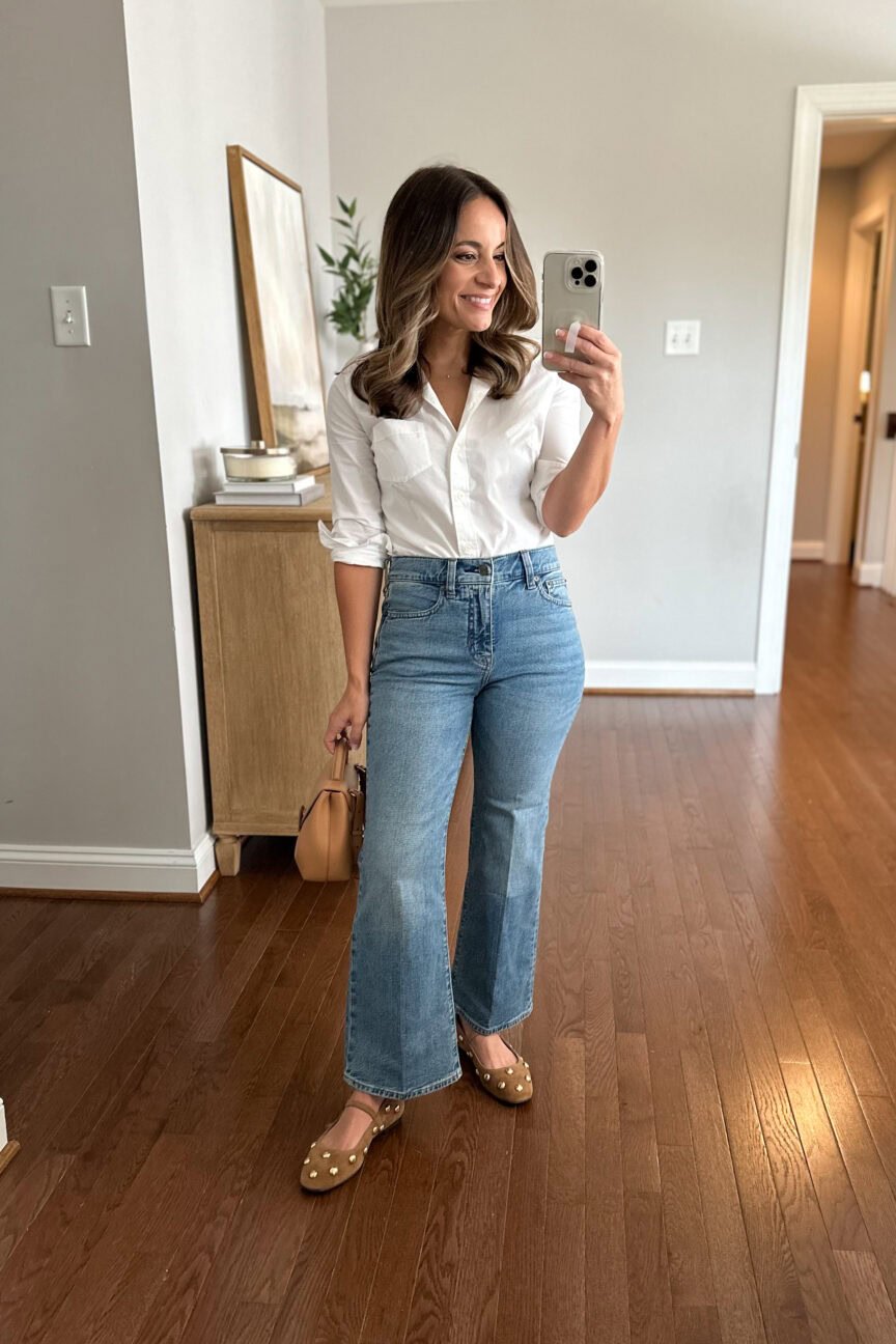 Casual fall outfit featuring light wash cropped flare jeans, a classic white button-down shirt, and studded ballet flats — a laid-back way to style studded flats for early fall.