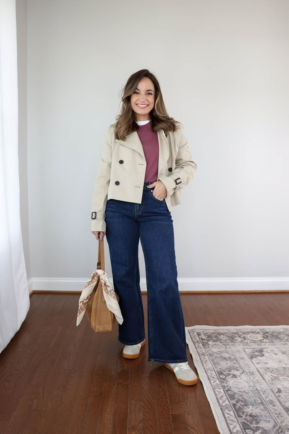 Brooke of Pumps and Push-Ups in a cropped trench, Quince Bella wide-leg jeans (28" inseam), and bone/white Gola Elan sneakers — petite fall outfit
