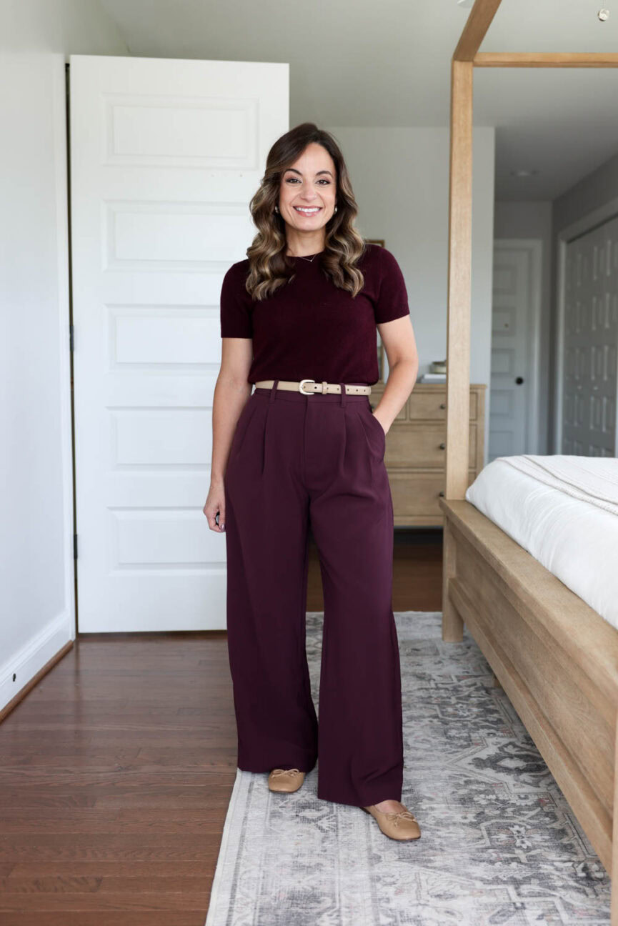 Brooke of Pumps and Push-Ups wearing purple Gap wide leg trousers styled with a burgundy Quince sweater for a petite-friendly tonal fall outfit.