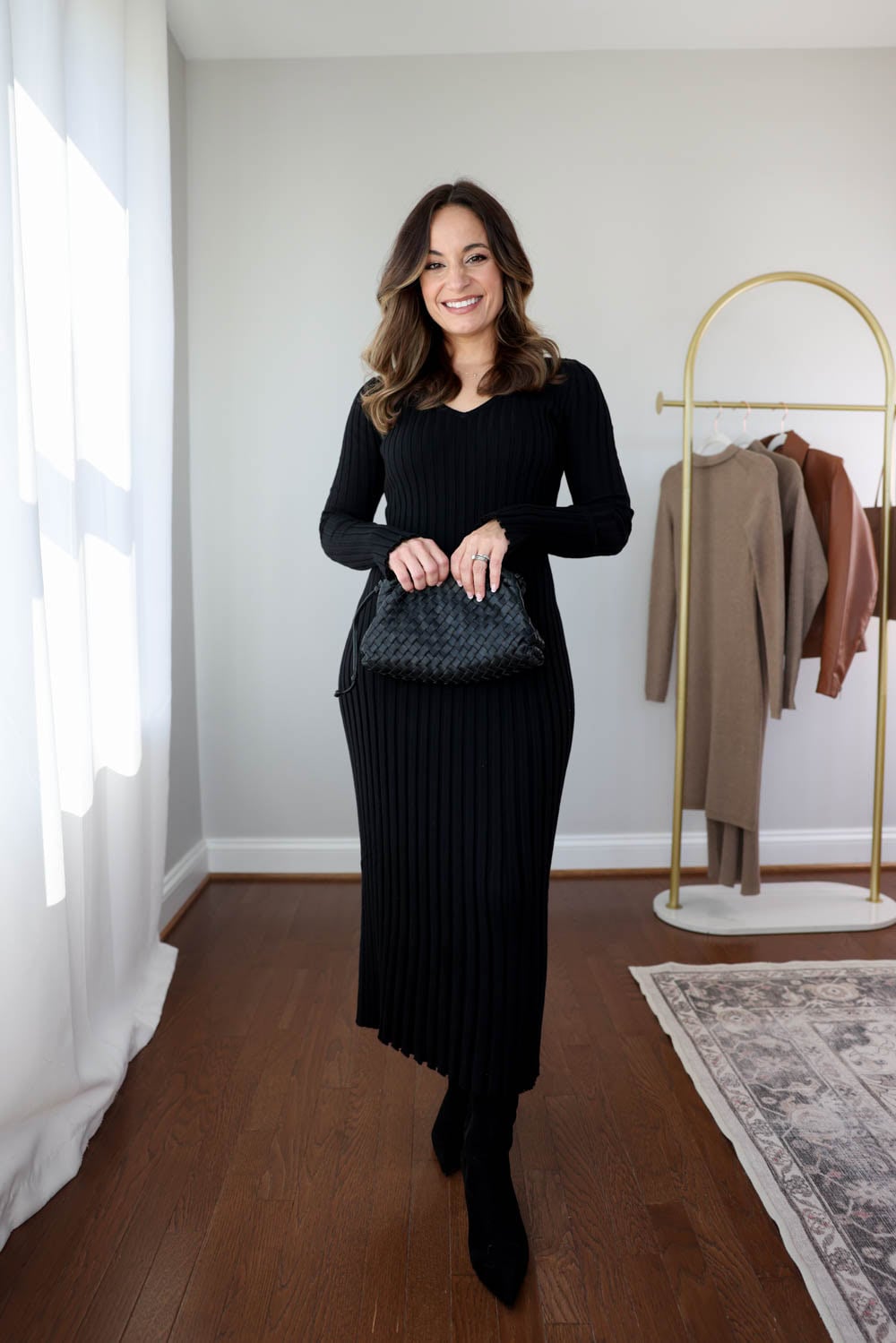 Brooke petite style blogger of Pumps and Push-Ups wearing Quince Cotton Cashmere Ribbed Long Sleeve V-Neck Midi Sweater Dress styled with knee high boots, a cozy petite-friendly fall outfit idea.