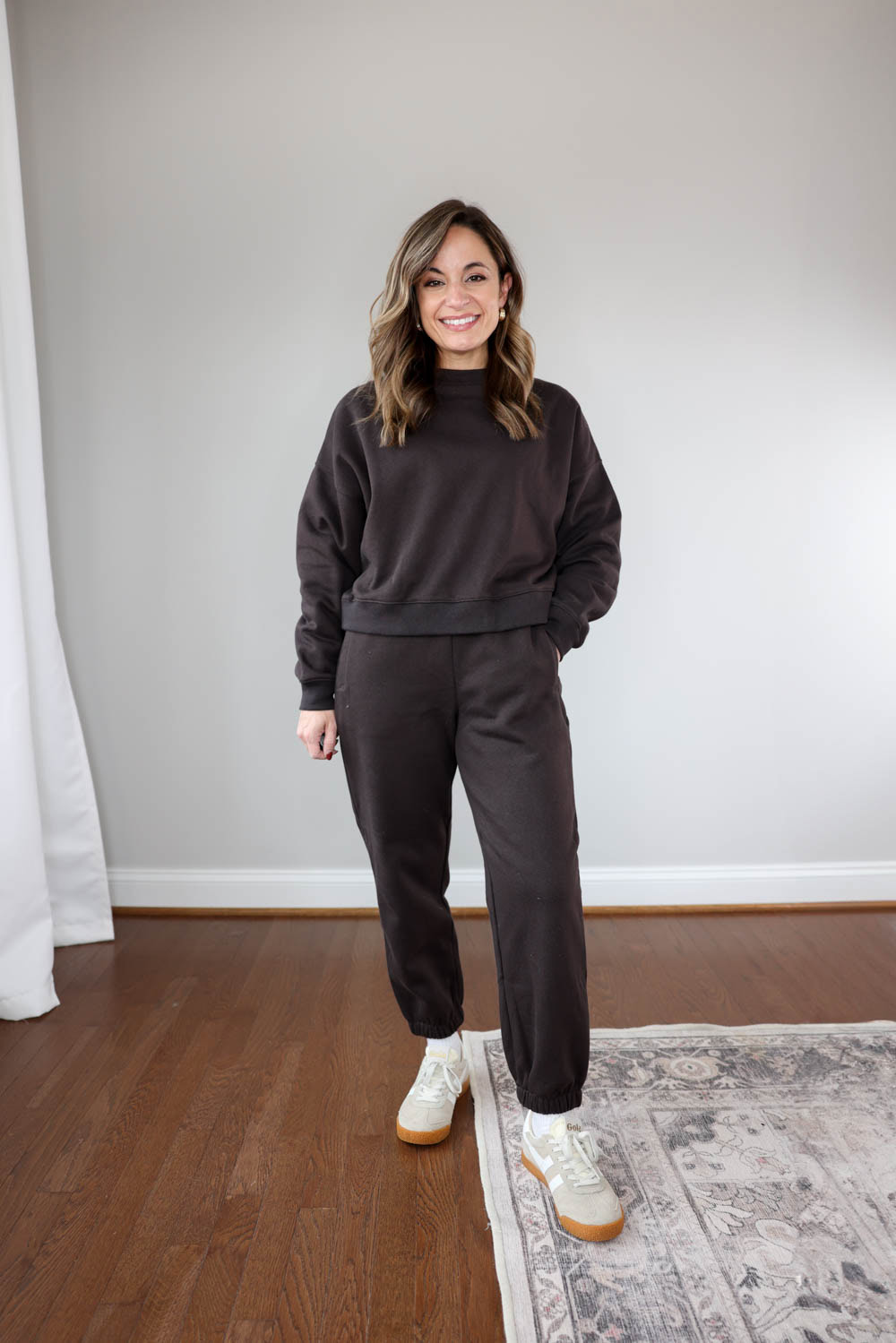 Petite style blogger Brooke wearing Gap Vintage Soft Joggers and Crewneck Sweatshirt in petite sizing — cozy matching set for petites.