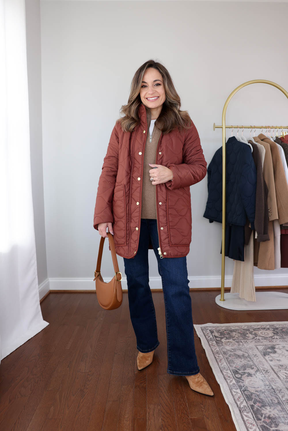 Brooke of Pumps and Push-Ups in the Quince ¼ zip fisherman cashmere sweater styled with petite flare jeans for a casual fall look.