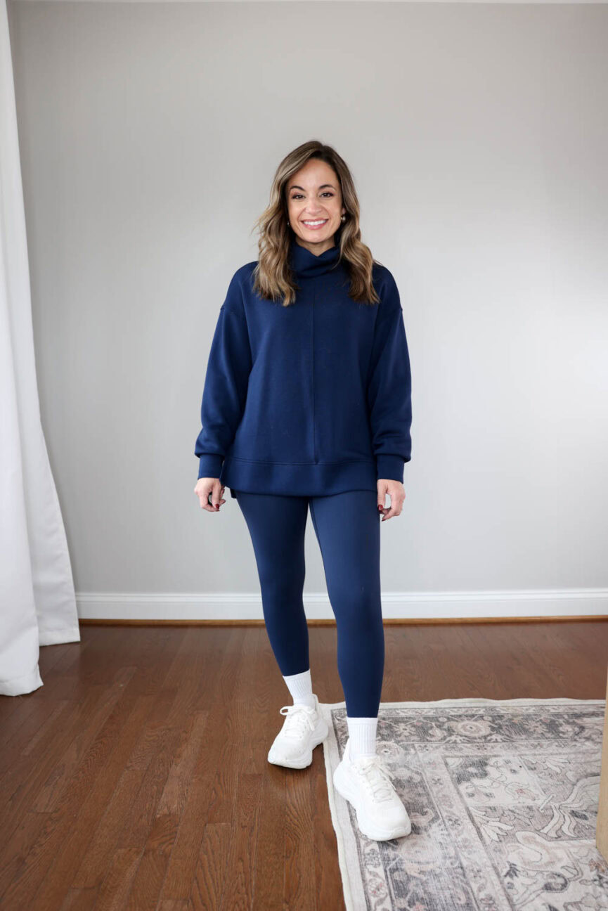 Brooke of Pumps and Push-Ups wearing Spanx Booty Boost 7/8 Leggings and AirEssentials Tunic Turtleneck — petite-friendly matching set for winter lounging and errands.