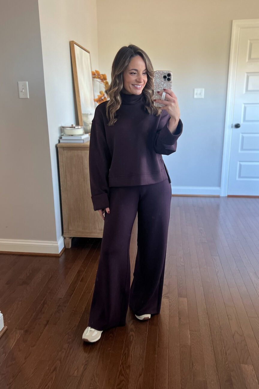 Brooke of Pumps and Push-Ups wearing Spanx AirEssentials Wide-Leg Pants and Crewneck Sweatshirt — cozy petite-friendly matching set for winter travel.