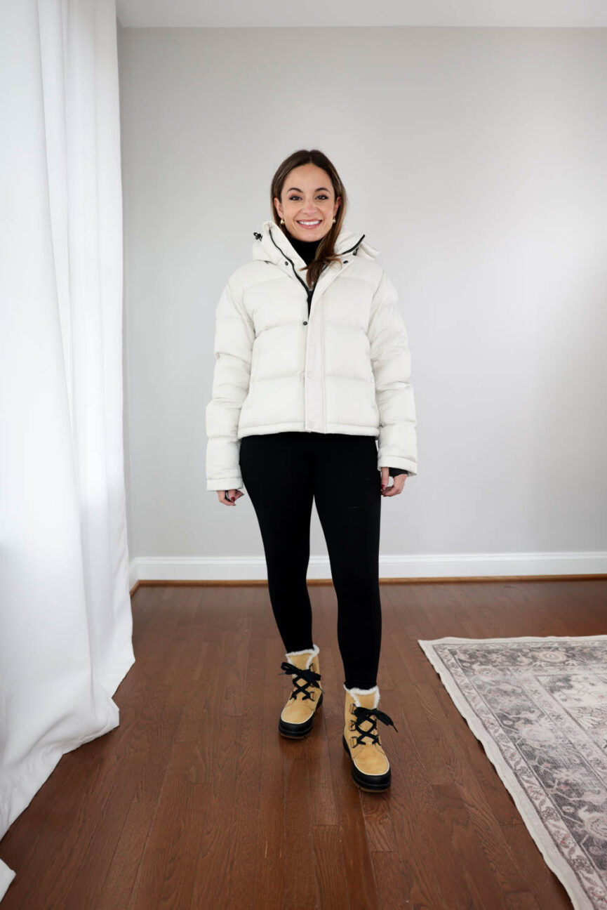 Brooke of Pumps and Push-Ups wearing the Aritzia Super Puff Shorty in XXS, showing cropped fit on a 4’10” petite frame.