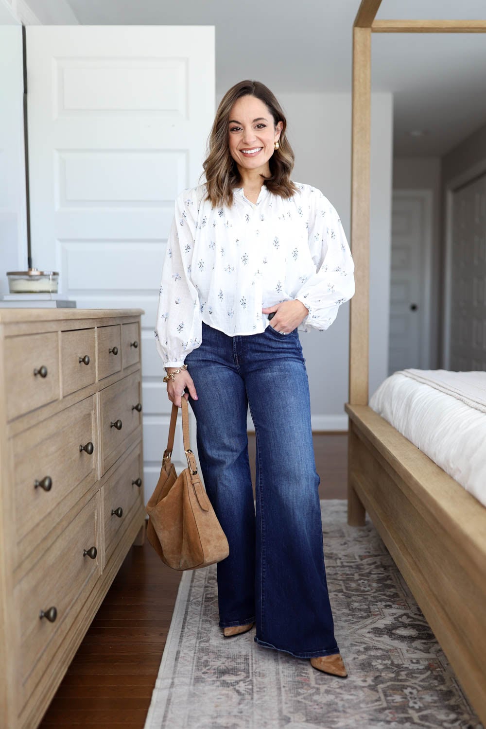 Early spring outfit for petites with a boho top and flare jeans | petite-friendly outfit ideas | spring outfit ideas
