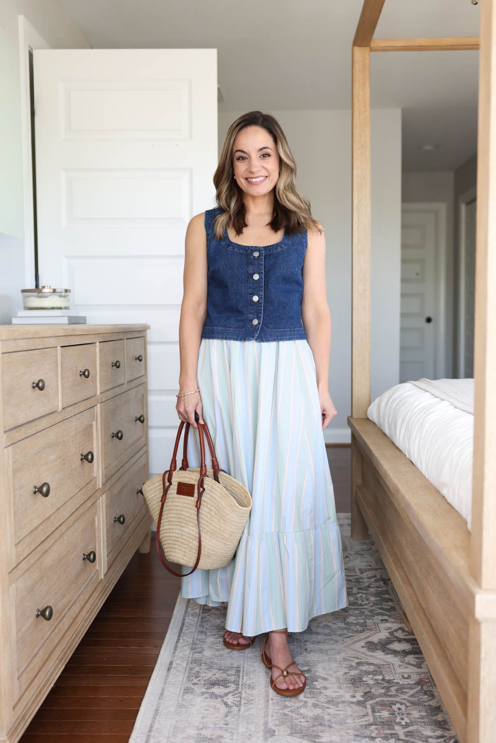 Petite-friendly maxi skirt worn with a denim vest on petite style blogger Brooke of Pumps and Push-Ups | petite-friendly summer skirts 