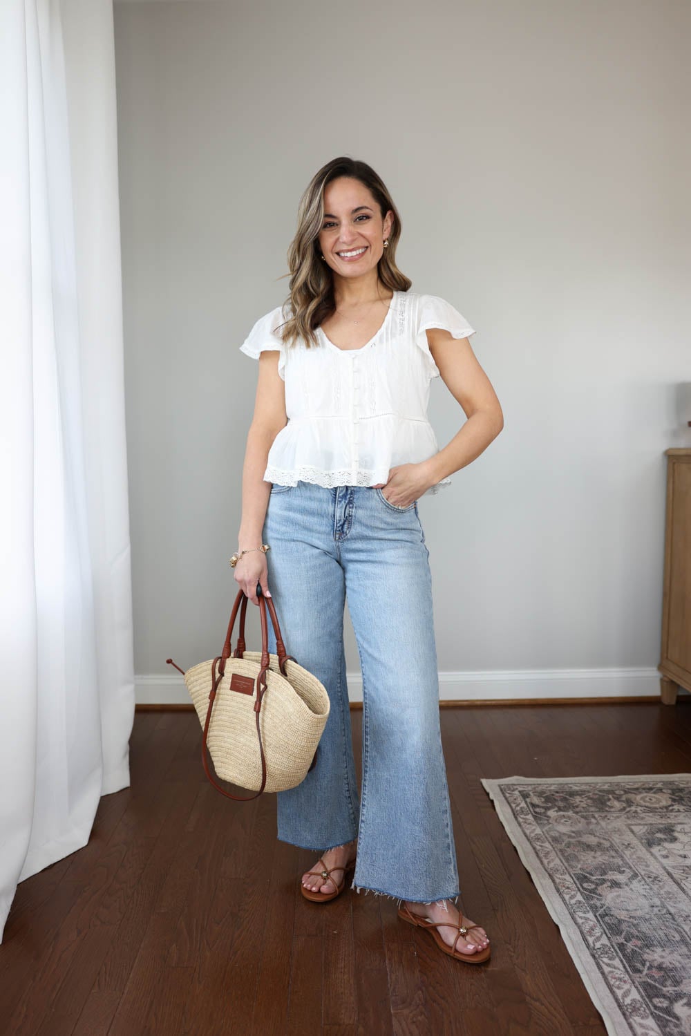 Petite-friendly spring outfit with light wash jeans and white peplum top | petite-friendly spring and summer outfits 