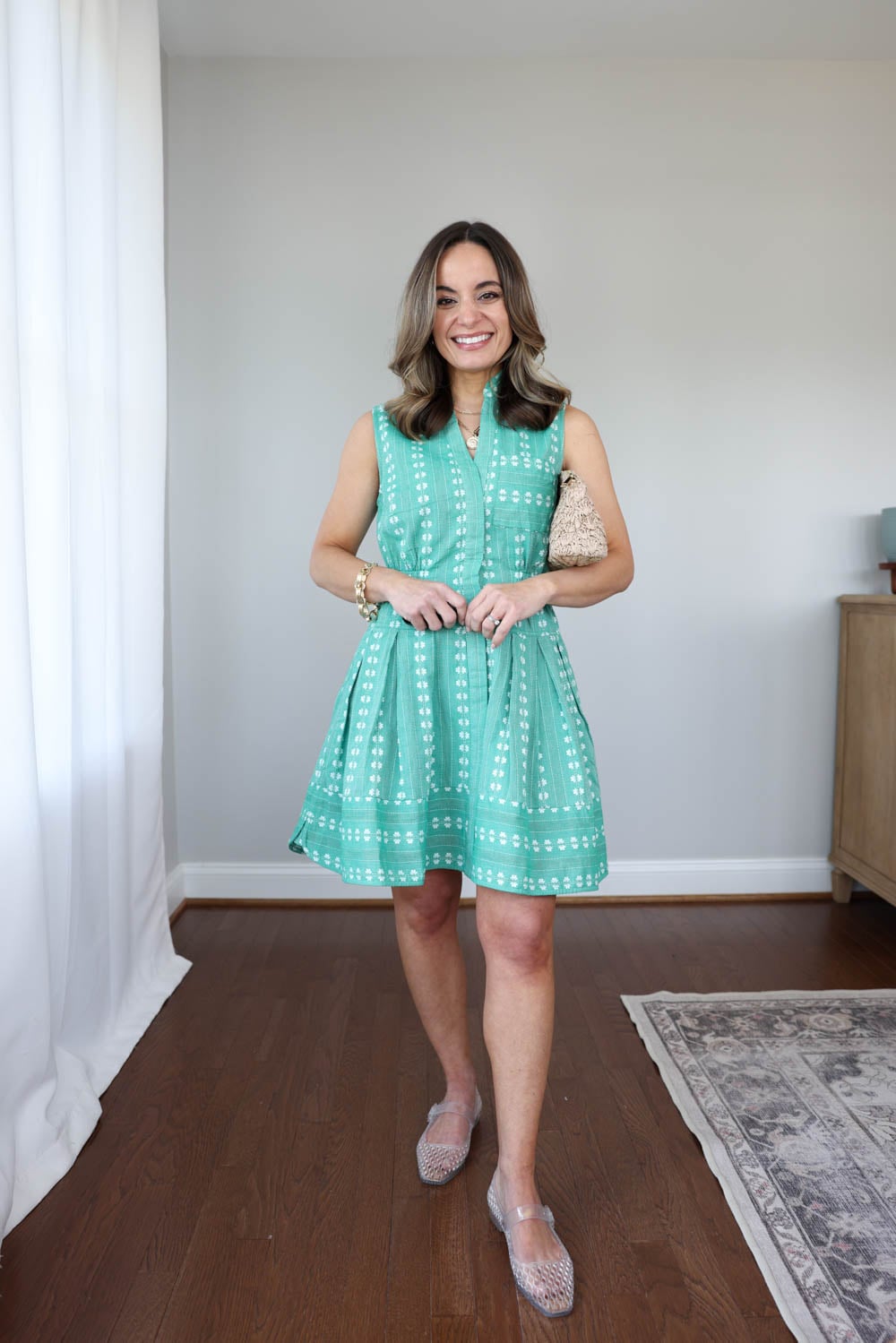Petite summer outfit with a green above-the-knee dress and clear jelly shoes styled on a 4’10” frame with petite-friendly summer fashion inspiration | ways to wear jelly ballet flats